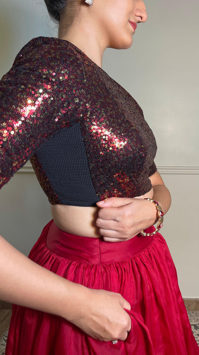 Surina x Tyohaar | Elbow Sleeves Red Sequined Shimmer Saree Blouse with Jewel Neck-Binks