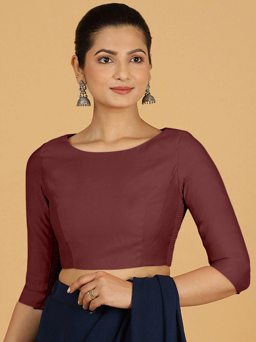 Tamanna x Rozaana Saree Blouse, in Maroon Viscose, featuring three quarter sleeves and boat neckline, made for daily & work.