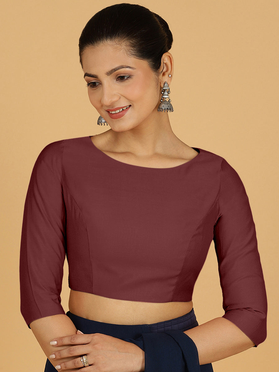 Tamanna x Rozaana Saree Blouse, in Maroon Viscose, featuring three quarter sleeves and boat neckline, made for daily & work.