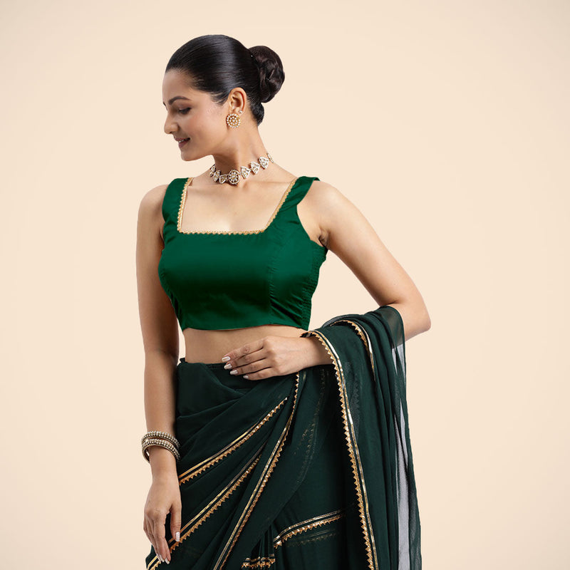 Tanvi x Tyohaar | Bottle Green Sleeveless FlexiFit™ Saree Blouse with Square Front Neck and Deep Back with Dori and Golden Gota Embellishment-Binks