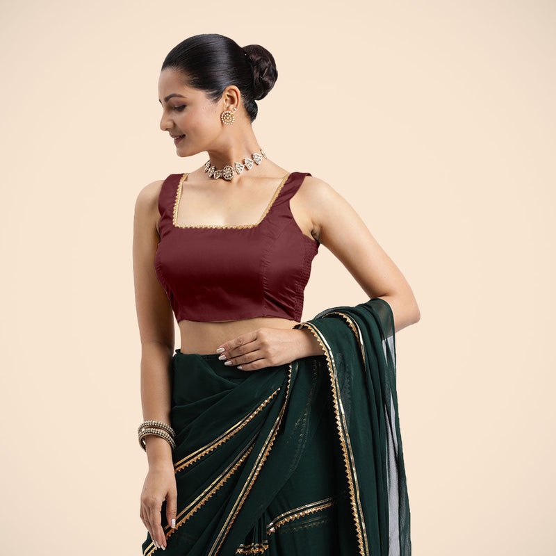 Tanvi x Tyohaar | Burgundy Sleeveless FlexiFit™ Saree Blouse with Square Front Neck and Deep Back with Dori and Golden Gota Embellishment-Binks