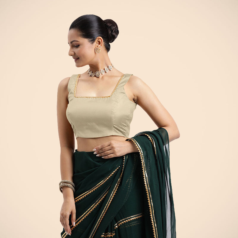 Tanvi x Tyohaar | Cream Sleeveless FlexiFit™ Saree Blouse with Square Front Neck and Deep Back with Dori and Golden Gota Embellishment-Binks