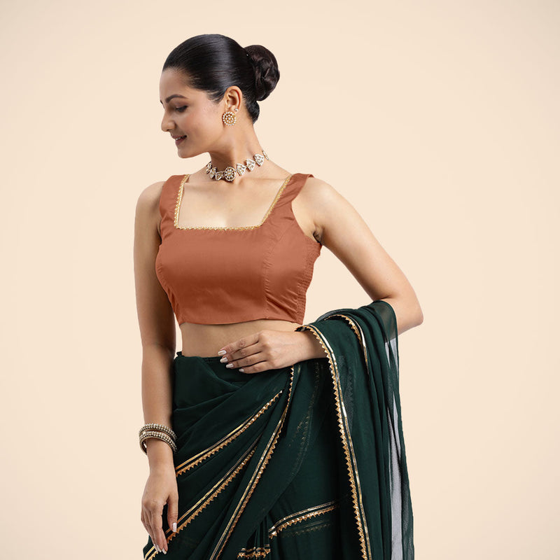 Tanvi x Tyohaar | Metallic Copper Sleeveless FlexiFit™ Saree Blouse with Square Front Neck and Deep Back with Dori and Golden Gota Embellishment-Binks