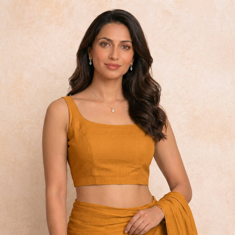 Tira | Sleeveless Marigold Orange Rayon Lycra StretchFit™ Saree Blouse-Binks