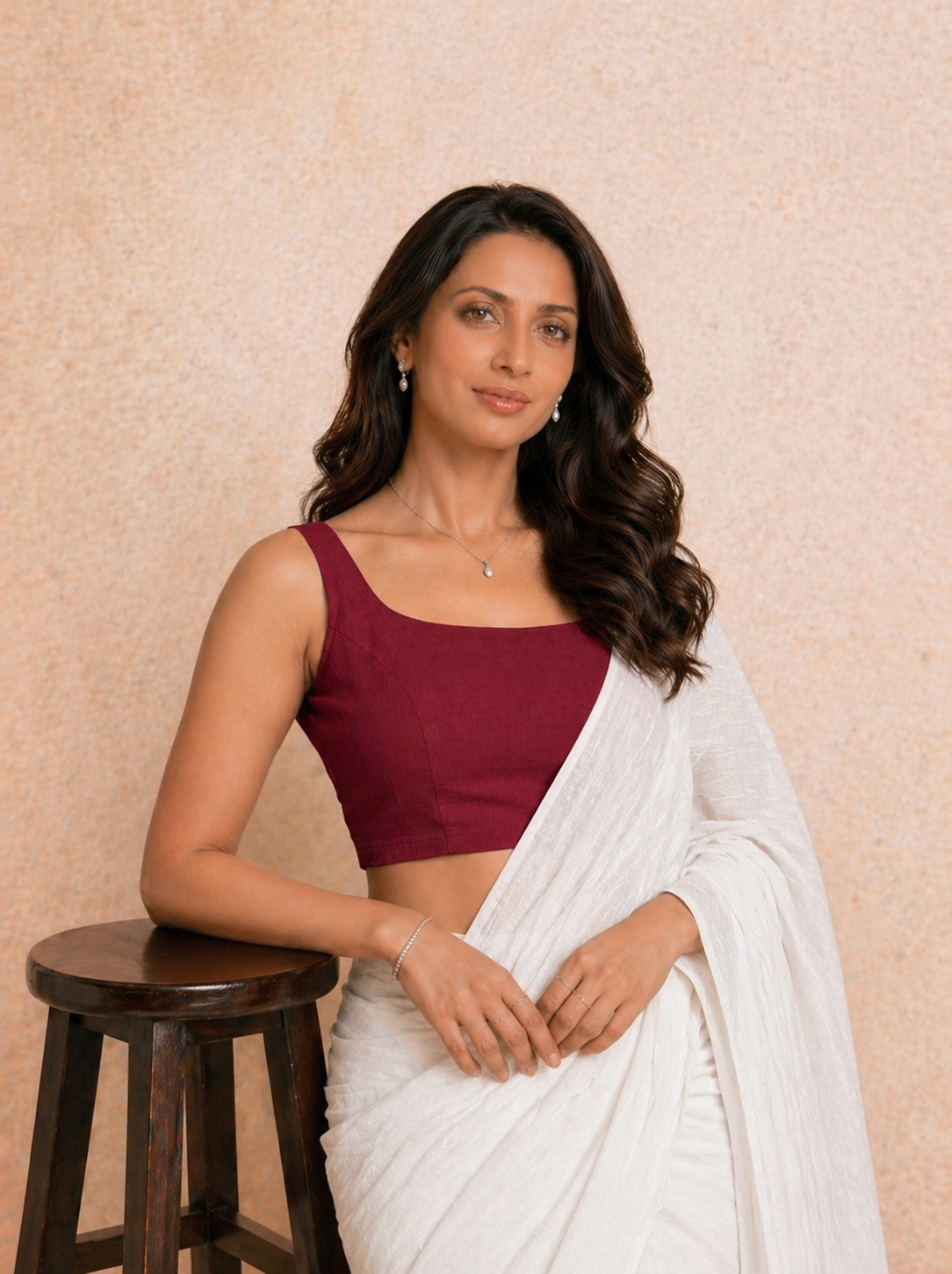 Tira Saree Blouse, in Red Rayon Lycra, featuring sleeveless and scoop neckline, made for daily & work.