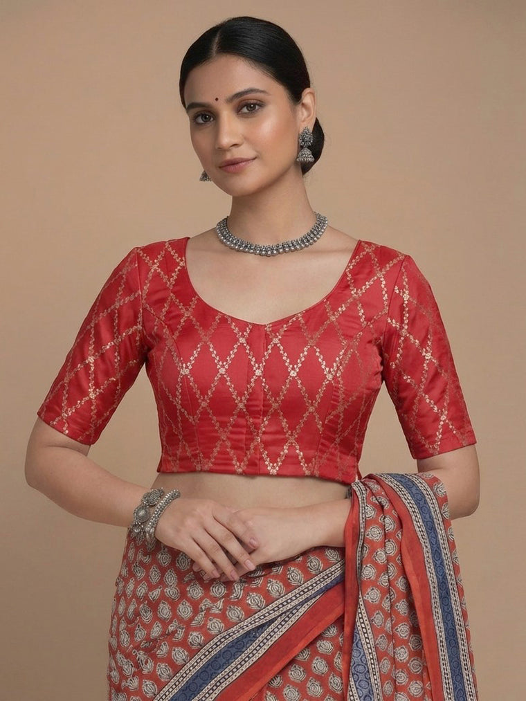 Vartika x Tyohaar Saree Blouse, in Red Viscose Silk Brocade, featuring elbow sleeves and round neckline.