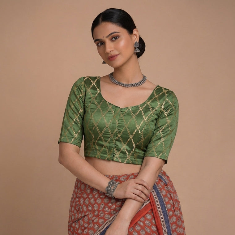 Vartika x Tyohaar Saree Blouse, in Green Viscose Silk Brocade, featuring elbow sleeves and round neckline.