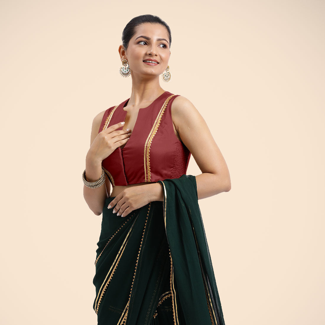 Veena x Tyohaar Saree Blouse, in Red Vegan Silk, featuring sleeveless and curved v-neckline, made for party & festive.
