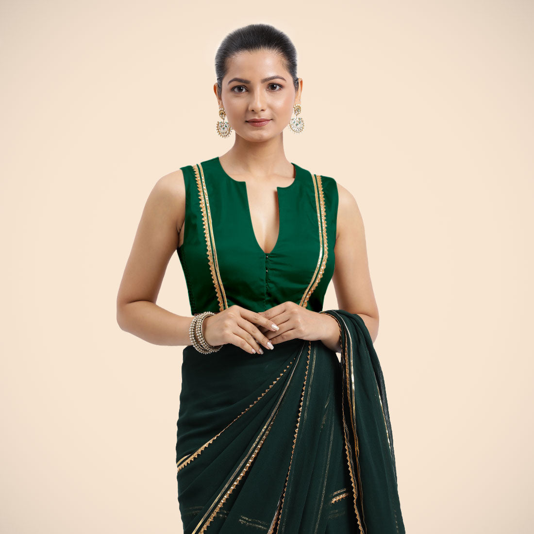 Veena x Tyohaar Saree Blouse, in Green Vegan Silk, featuring sleeveless and curved v-neckline, made for party & festive.