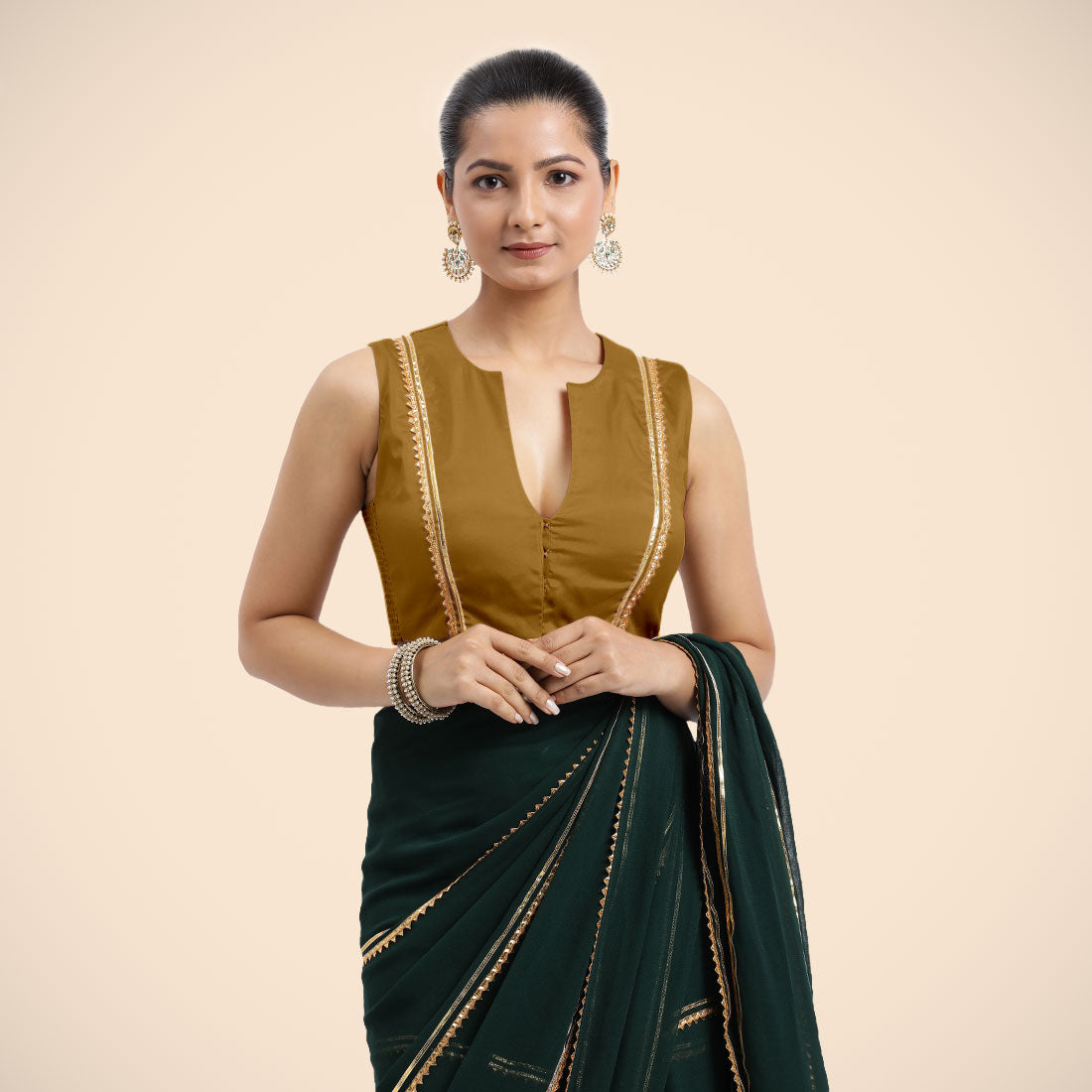 Veena x Tyohaar Saree Blouse, in Gold Vegan Silk, featuring sleeveless and curved v-neckline, made for party & festive.
