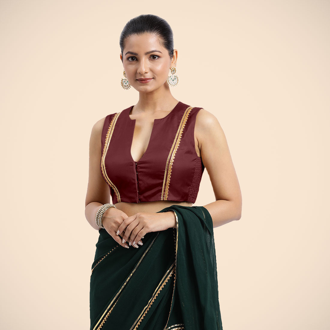 Veena x Tyohaar Saree Blouse, in Maroon Vegan Silk, featuring sleeveless and curved v-neckline, made for party & festive.