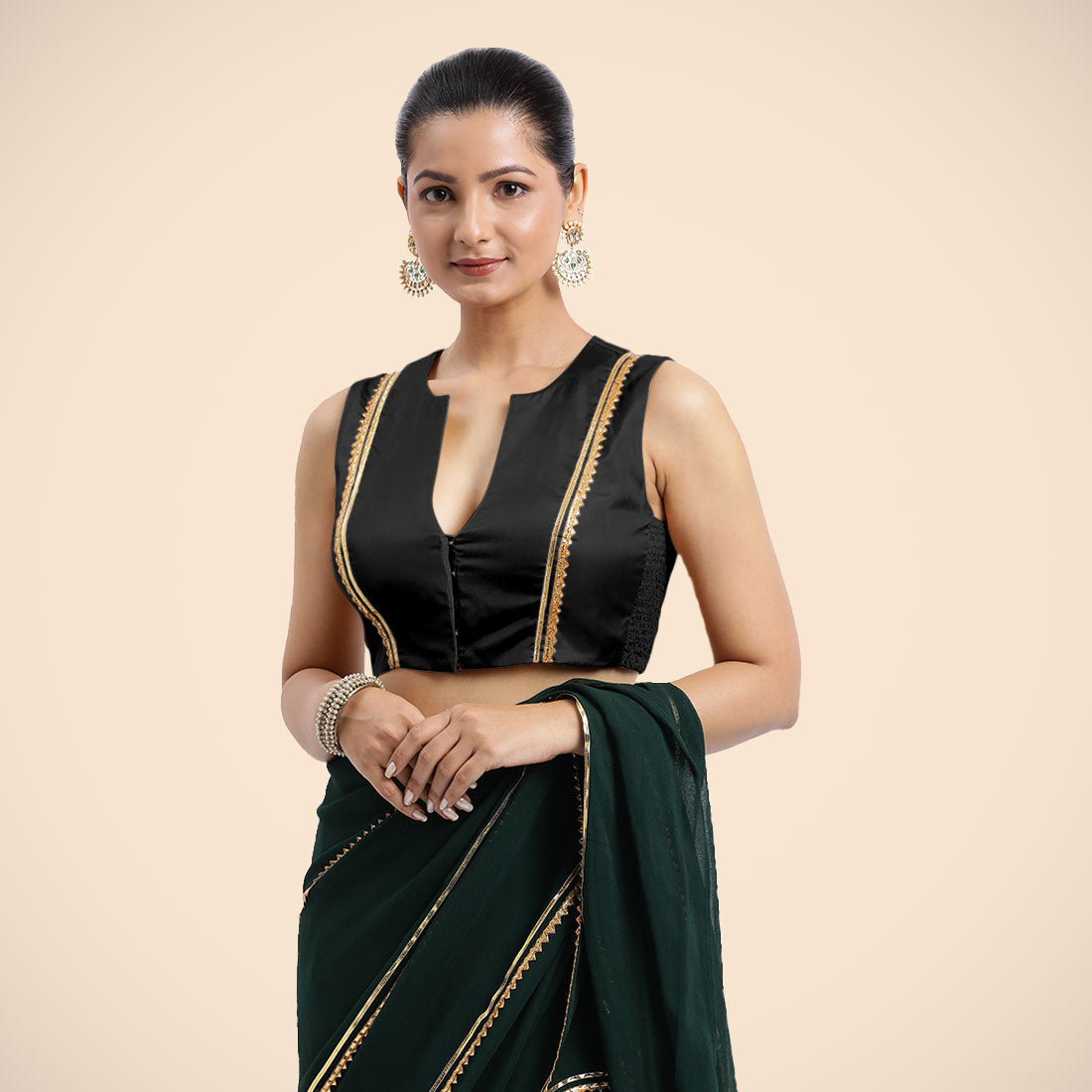 Veena x Tyohaar Saree Blouse, in Black Vegan Silk, featuring sleeveless and curved v-neckline, made for party & festive.