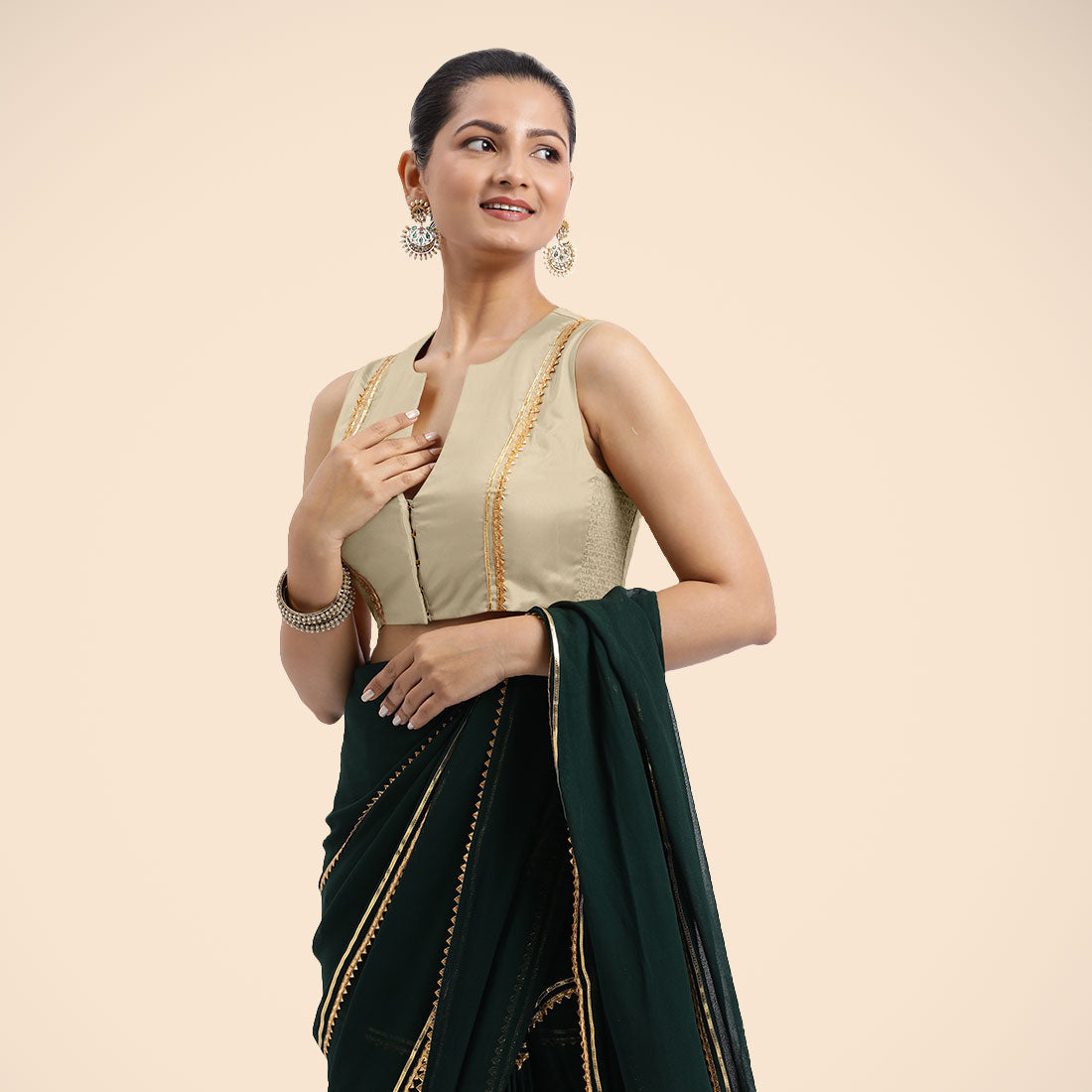Veena x Tyohaar Saree Blouse, in Cream Vegan Silk, featuring sleeveless and curved v-neckline, made for party & festive.