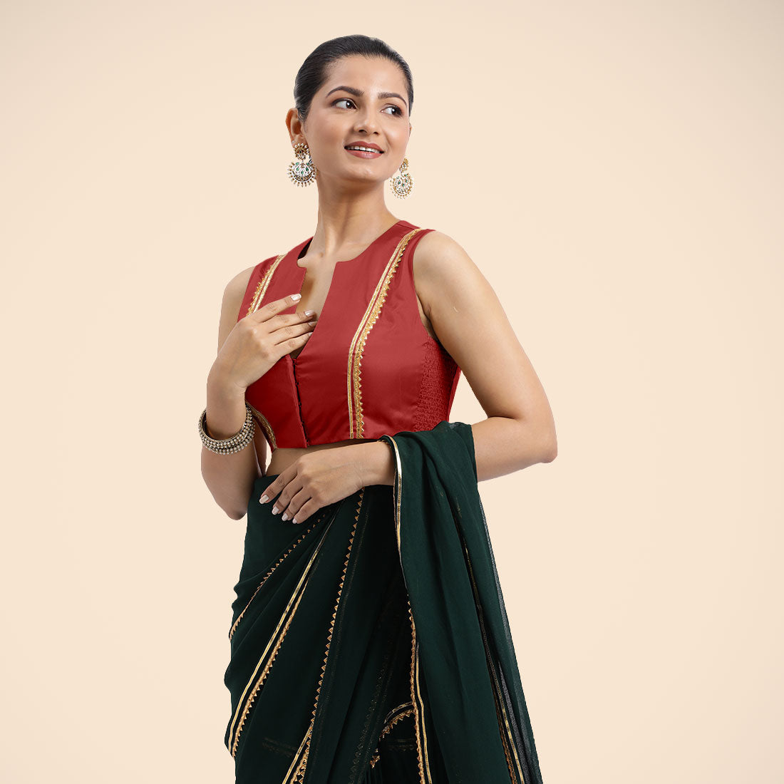 Veena x Tyohaar Saree Blouse, in Red Vegan Silk, featuring sleeveless and curved v-neckline, made for party & festive.
