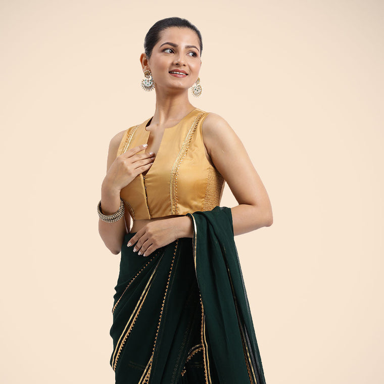 Veena x Tyohaar Saree Blouse, in Gold Vegan Silk, featuring sleeveless and curved v-neckline, made for party & festive.
