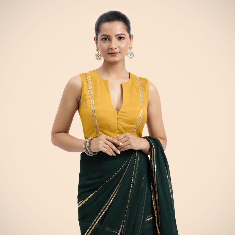 Veena x Tyohaar | Sleeveless Marigold Yellow FlexiFit™ Gota Embellished Saree Blouse with Curved V-Neck-Binks
