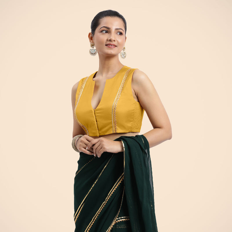 Veena x Tyohaar | Sleeveless Marigold Yellow FlexiFit™ Gota Embellished Saree Blouse with Curved V-Neck-Binks