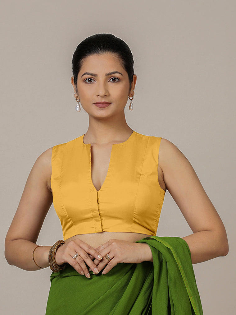 Veena x Rozaana Saree Blouse, in Yellow Artificial Silk, featuring sleeveless and curved v-neckline.