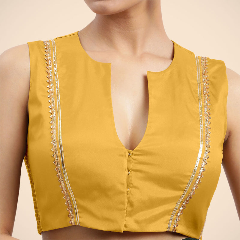 Veena x Tyohaar | Sleeveless Marigold Yellow FlexiFit™ Gota Embellished Saree Blouse with Curved V-Neck-Binks