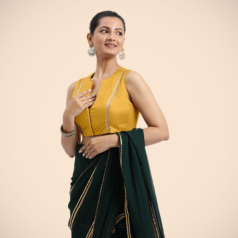 Veena x Tyohaar | Sleeveless Marigold Yellow FlexiFit™ Gota Embellished Saree Blouse with Curved V-Neck-Binks