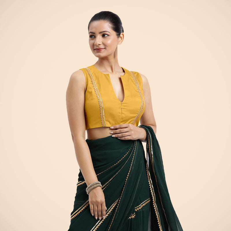 Veena x Tyohaar | Sleeveless Marigold Yellow FlexiFit™ Gota Embellished Saree Blouse with Curved V-Neck-Binks