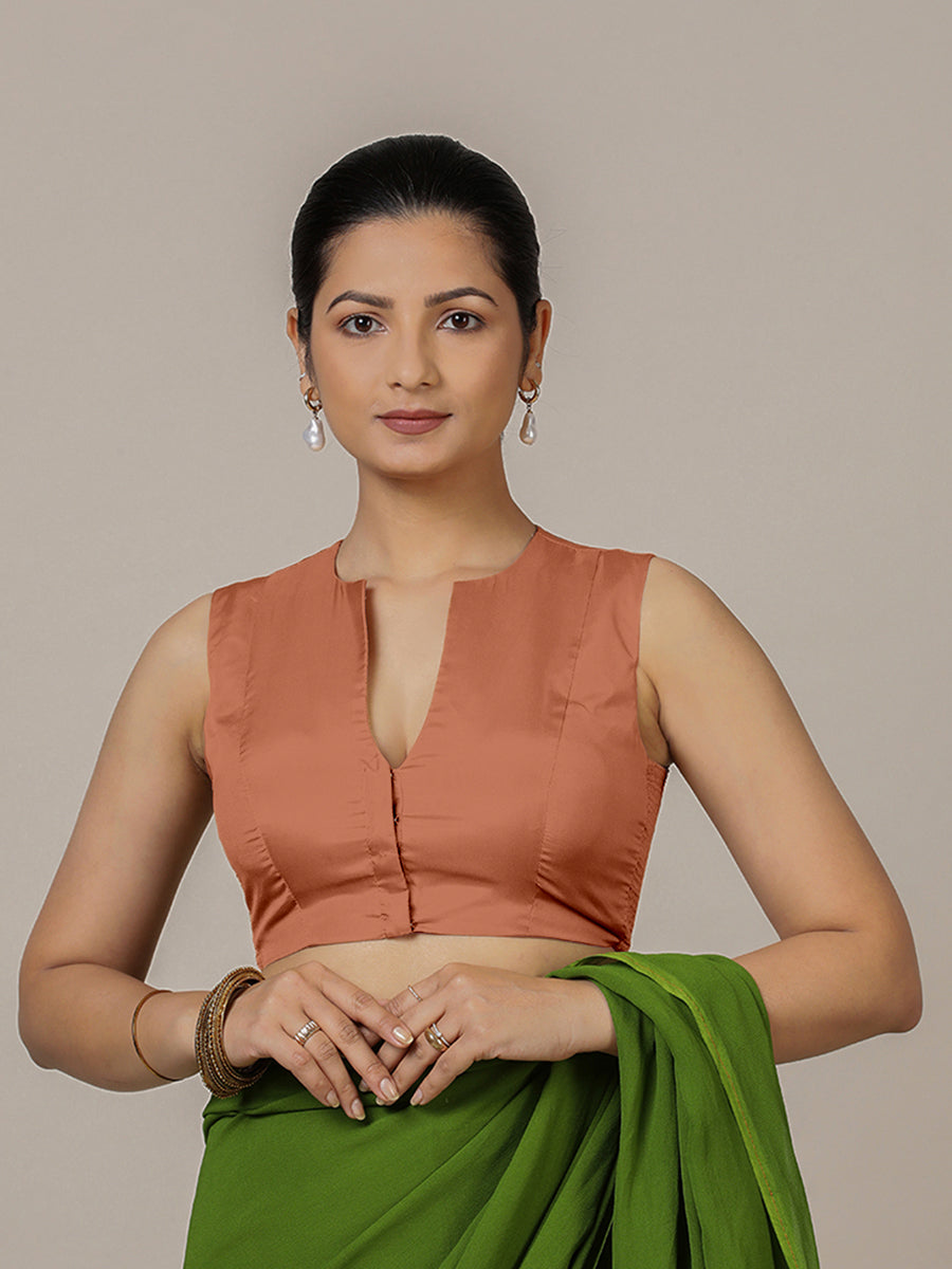 Veena x Rozaana Saree Blouse, in Copper Vegan Silk, featuring sleeveless and curved v-neckline, made for party & festive.