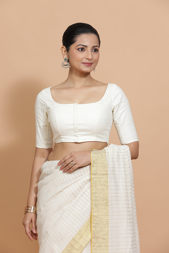 Vritika x Rozaana Saree Blouse, in White Cotton, featuring elbow sleeves and scoop neckline, made for daily & work.