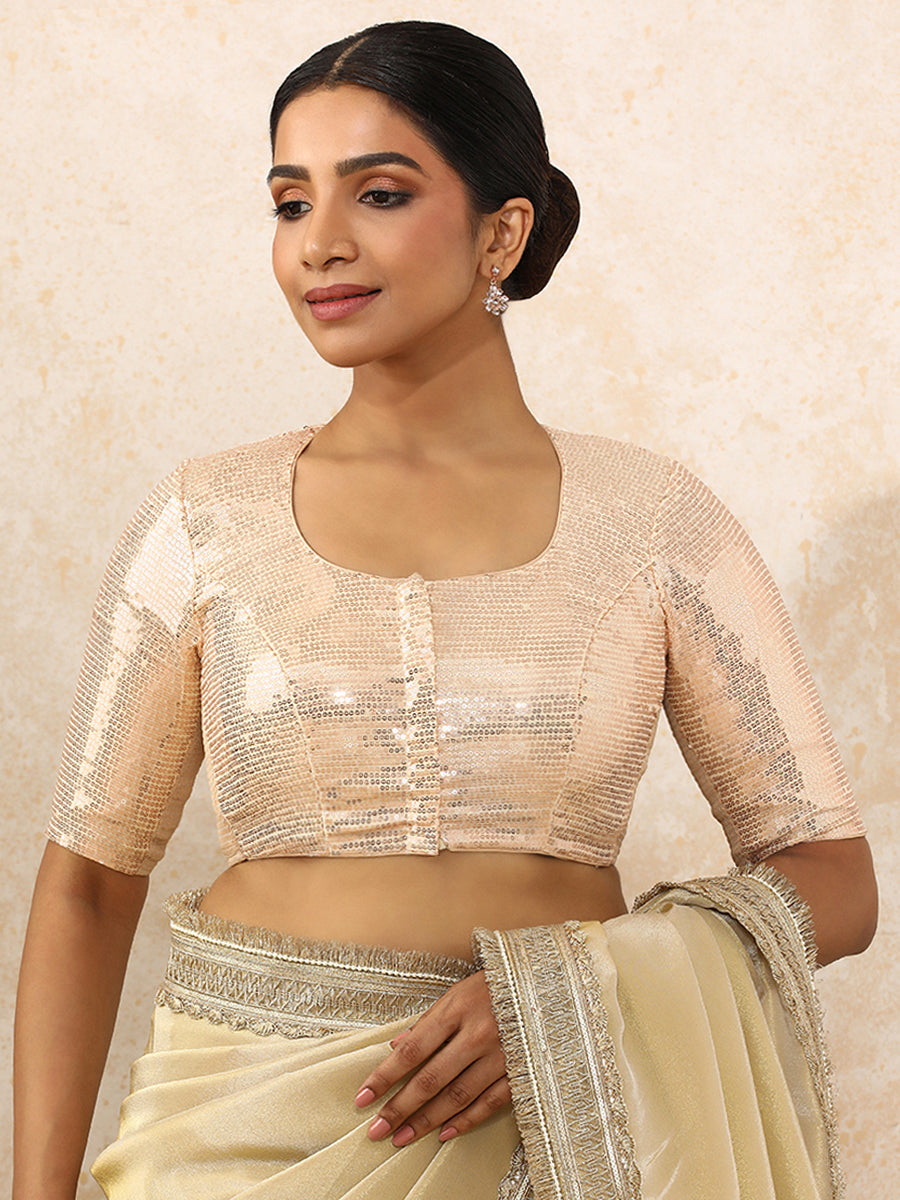 Yashvi x Tyohaar Saree Blouse, in Cream Sequin Fabric, featuring elbow sleeves and pot neckline, made for party & festive.