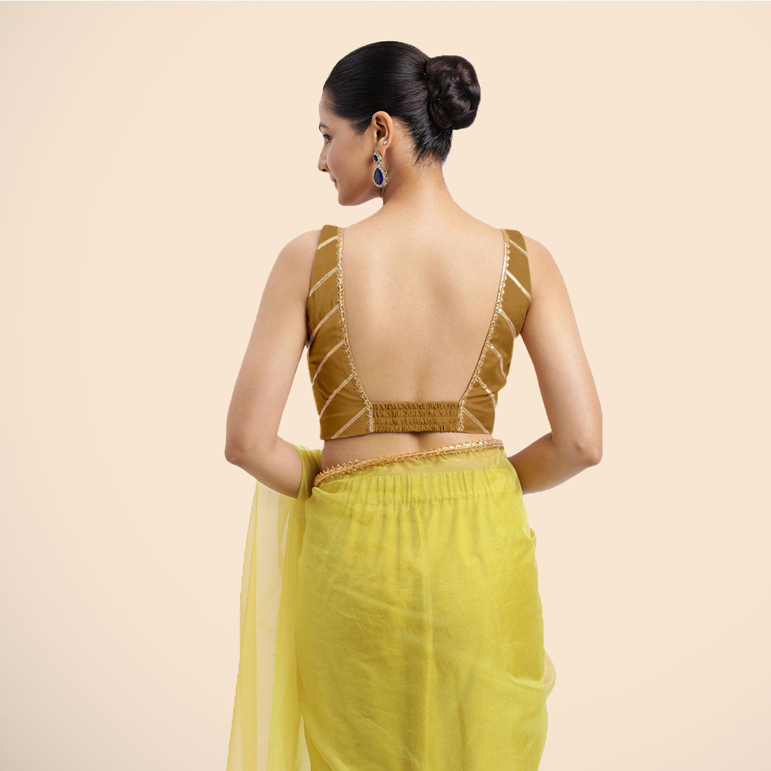 Zeba x Tyohaar Saree Blouse, in Gold Vegan Silk, featuring sleeveless and square neckline, made for party & festive (view 3).