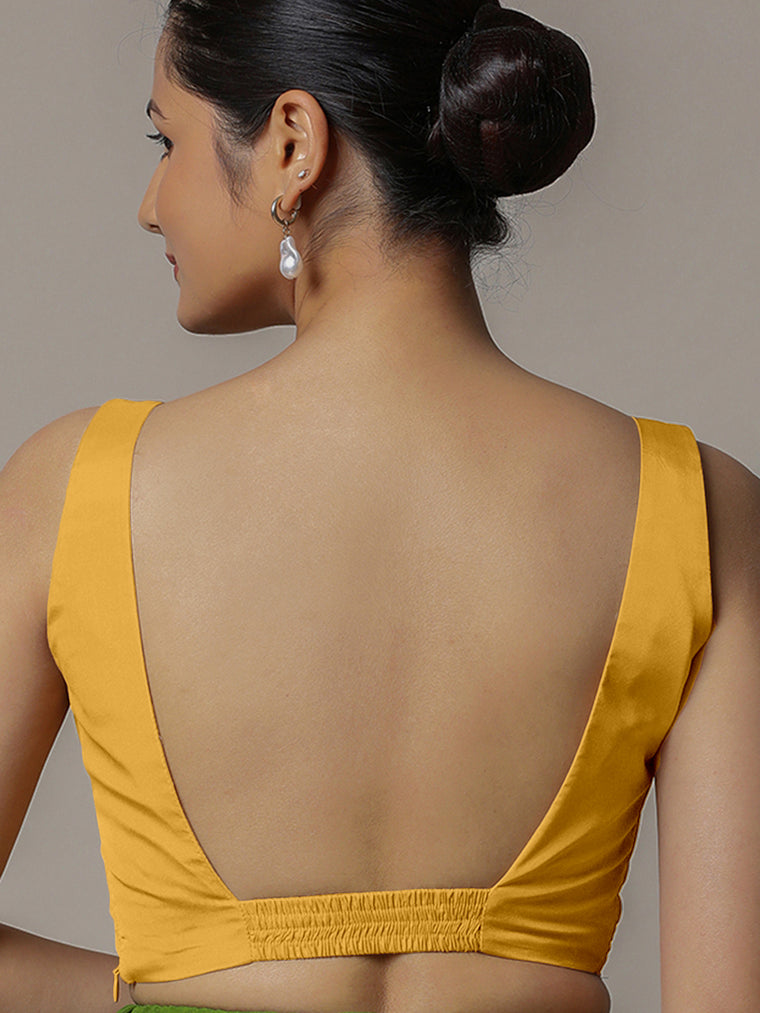 Zeba x Rozaana Saree Blouse, in Yellow Artificial Silk, featuring sleeveless and square neckline, made for party & festive.