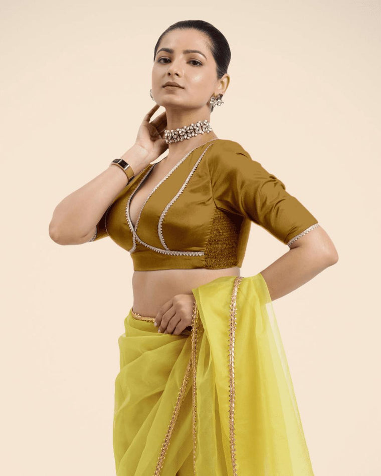 Zeenat x Tyohaar Saree Blouse, in Gold Vegan Silk, featuring elbow sleeves and v-neckline, made for party & festive.