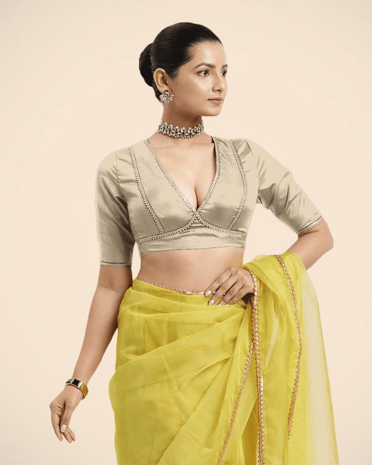Zeenat x Tyohaar Saree Blouse, in Cream Vegan Silk, featuring elbow sleeves and v-neckline, made for party & festive.