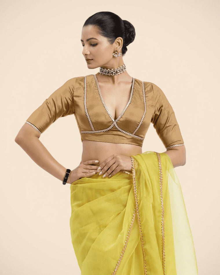 Zeenat x Tyohaar Saree Blouse, in Gold Vegan Silk, featuring elbow sleeves and v-neckline, made for party & festive.