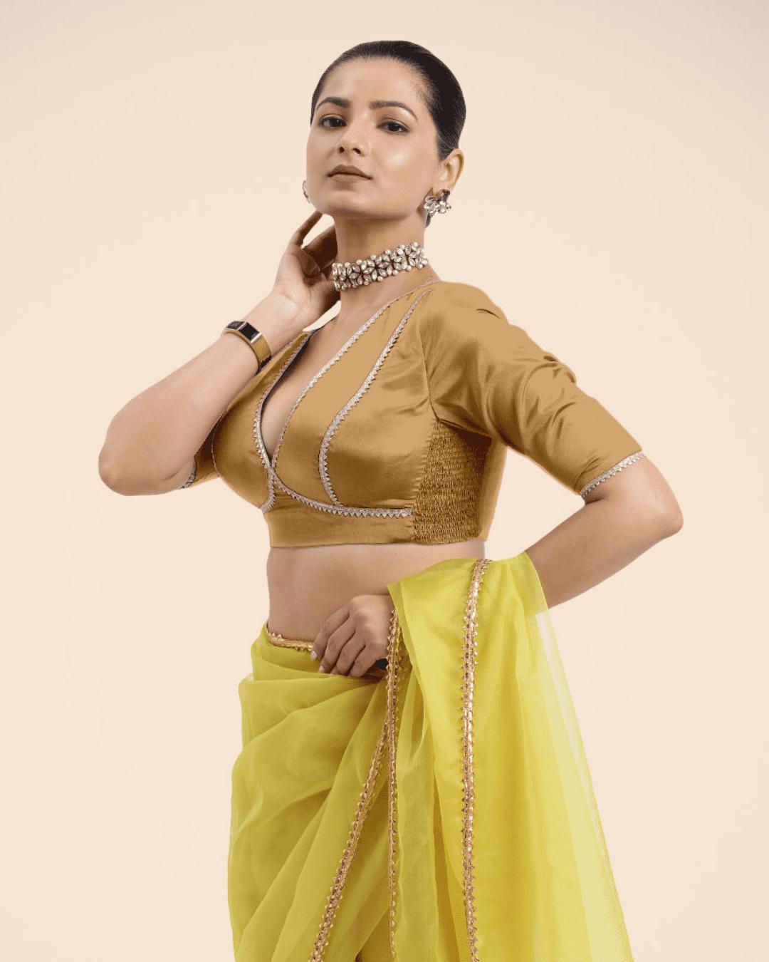 Zeenat x Tyohaar Saree Blouse, in Gold Vegan Silk, featuring elbow sleeves and v-neckline, made for party & festive (view 4).