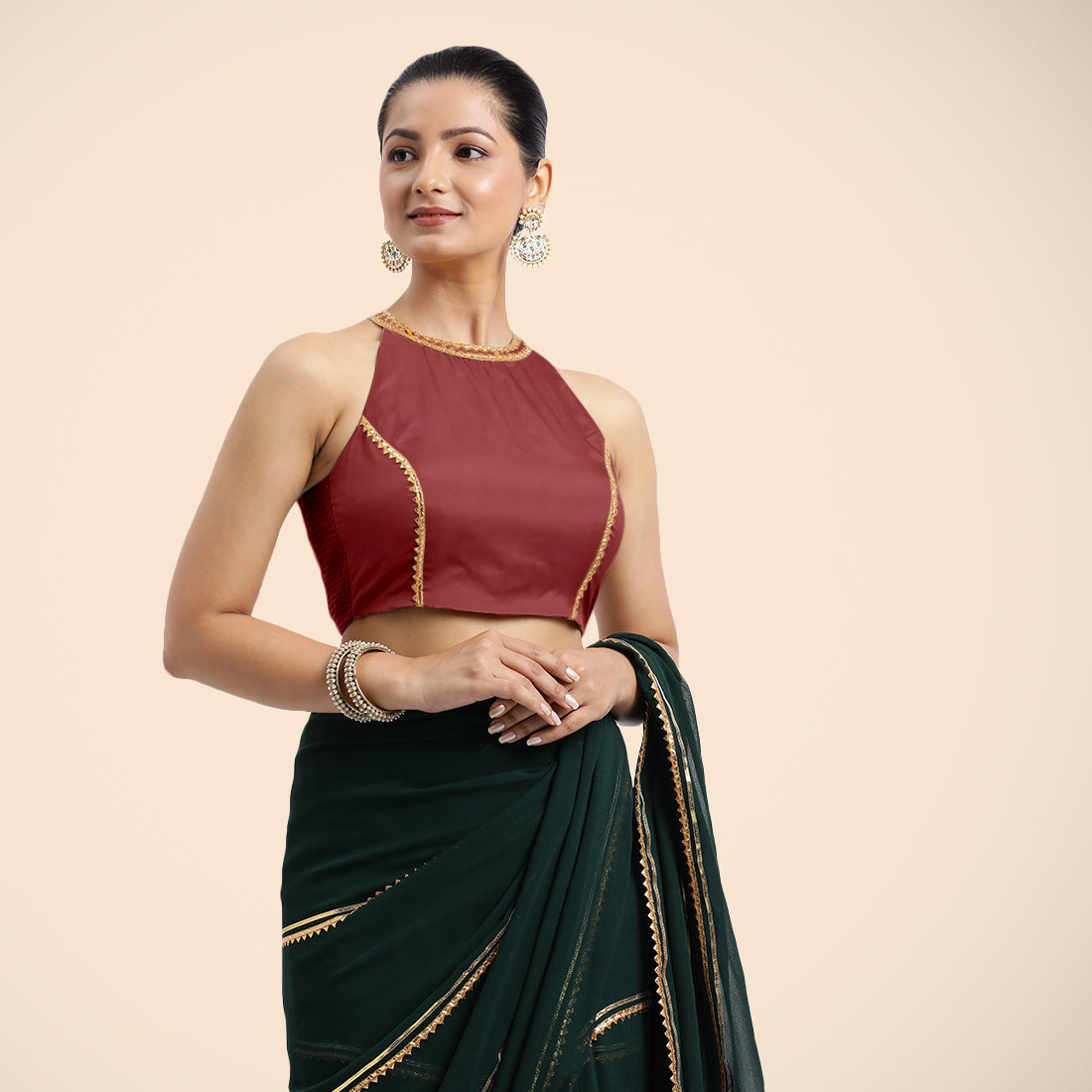 Zubeida x Tyohaar Saree Blouse, in Red Vegan Silk, featuring sleeveless and halter neckline, made for party & festive.