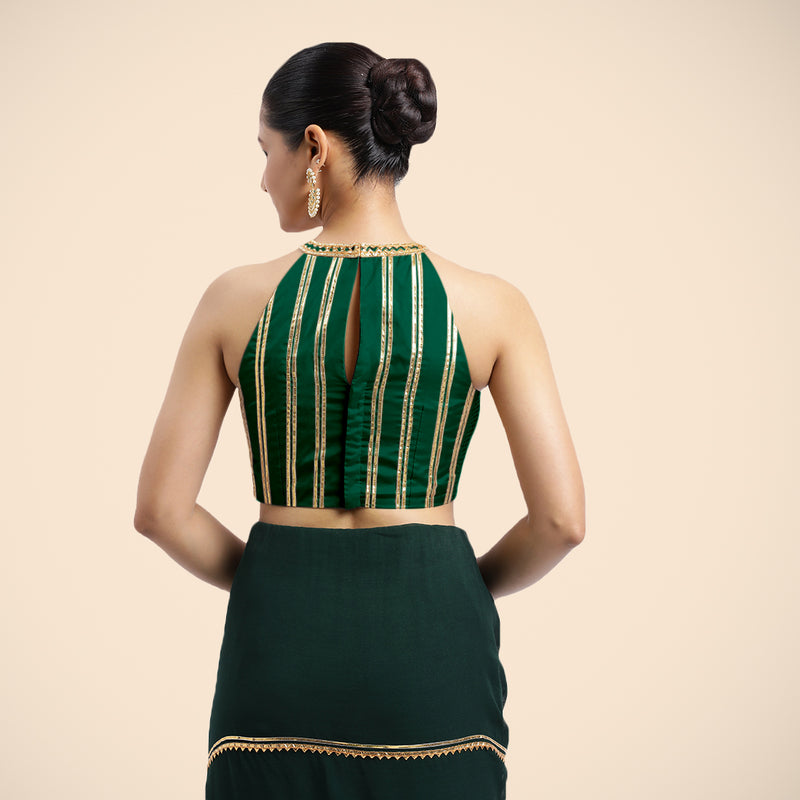 Zubeida x Tyohaar | Bottle Green Halterneck FlexiFit™ Saree Blouse with Elegant Golden Gota Embellishment on Princess Line-Binks