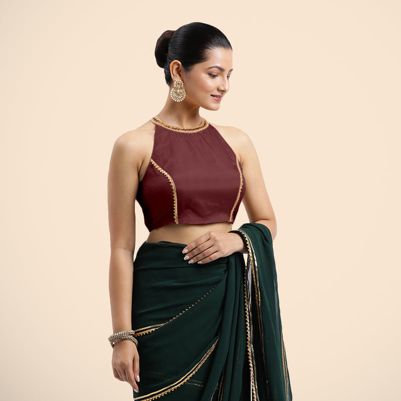 Zubeida x Tyohaar | Burgundy Halterneck FlexiFit™ Saree Blouse with Elegant Golden Gota Embellishment on Princess Line-Binks