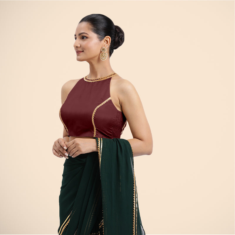 Zubeida x Tyohaar | Burgundy Halterneck FlexiFit™ Saree Blouse with Elegant Golden Gota Embellishment on Princess Line-Binks