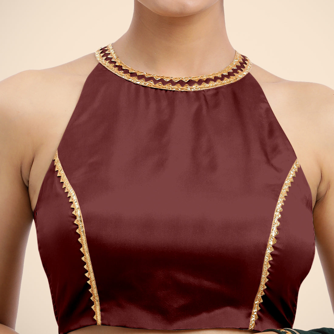 Zubeida x Tyohaar Saree Blouse, in Maroon Vegan Silk, featuring sleeveless and halter neckline, made for party & festive.