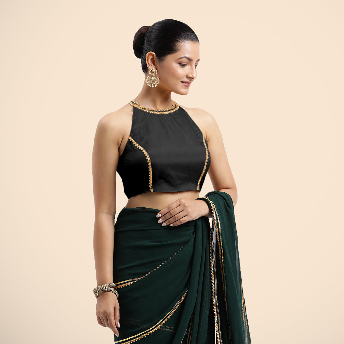 Zubeida x Tyohaar Saree Blouse, in Black Vegan Silk, featuring sleeveless and halter neckline, made for party & festive.