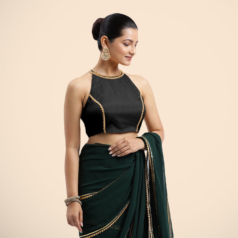 Zubeida x Tyohaar | Charcoal Black Halterneck FlexiFit™ Saree Blouse with Elegant Golden Gota Embellishment on Princess Line-Binks