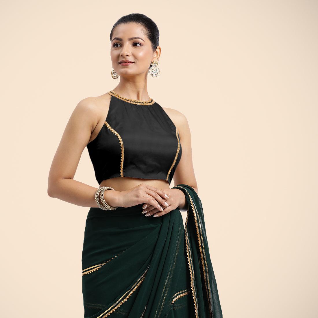 Zubeida x Tyohaar Saree Blouse, in Black Vegan Silk, featuring sleeveless and halter neckline, made for party & festive.
