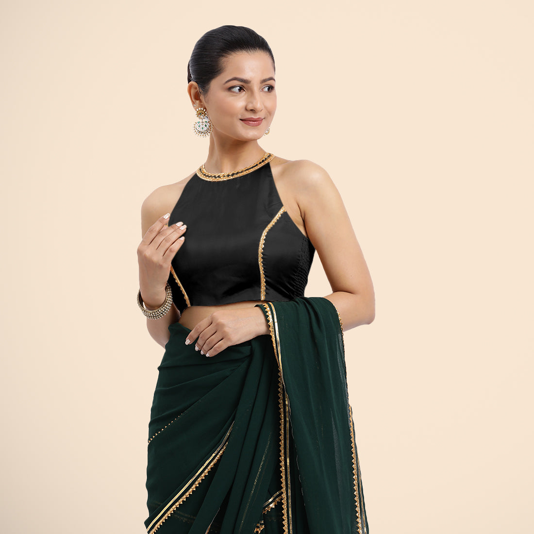 Zubeida x Tyohaar Saree Blouse, in Black Vegan Silk, featuring sleeveless and halter neckline, made for party & festive.