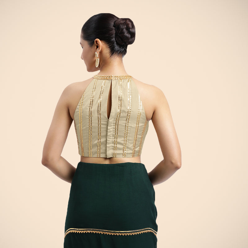 Zubeida x Tyohaar | Cream Halterneck FlexiFit™ Saree Blouse with Elegant Golden Gota Embellishment on Princess Line-Binks