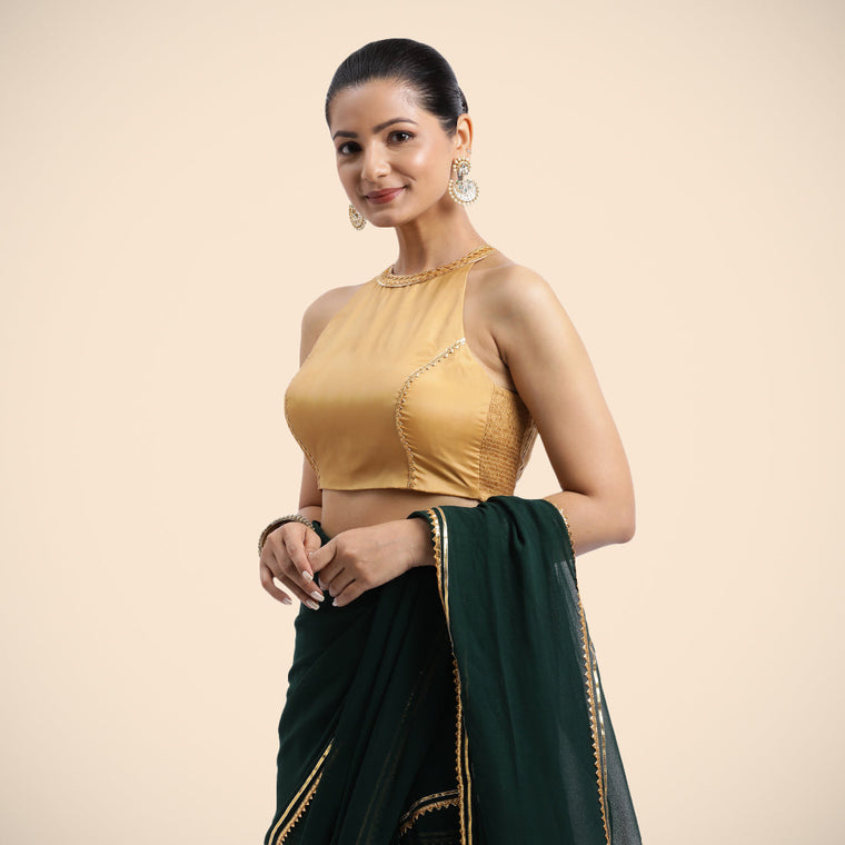 Zubeida x Tyohaar Saree Blouse, in Gold Vegan Silk, featuring sleeveless and halter neckline, made for party & festive (view 2).