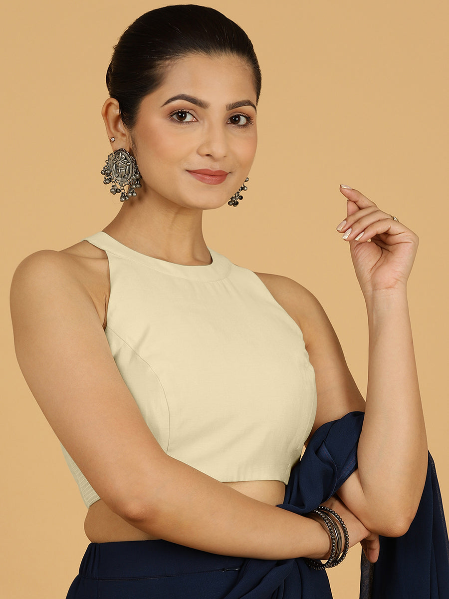 Zubeida x Rozaana Saree Blouse, in White Viscose, featuring sleeveless and halter neckline, made for daily & work.