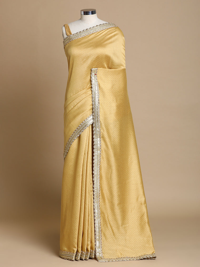 Anwesha x Tyohaar Saree, in Gold Chandheri, made for party & festive.