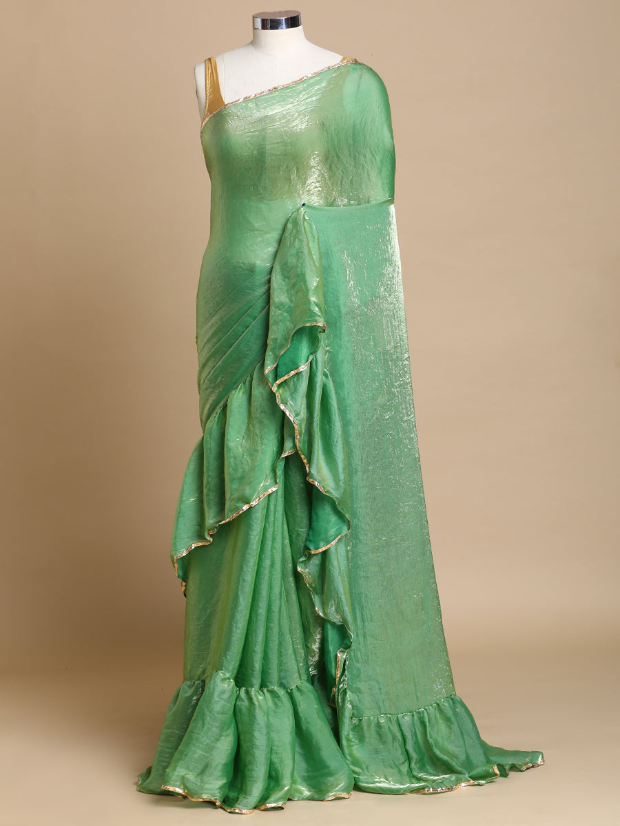 Sharmila x Tyohaar Saree, in Green Tissue Fabric, made for party & festive.
