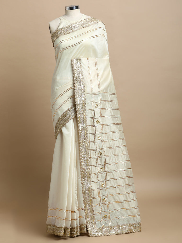 Sringara x Tyohaar Saree, in White Chandheri, made for party & festive.