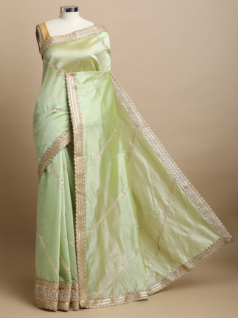 Suhasini x Tyohaar Saree, in Green Chandheri, made for party & festive.